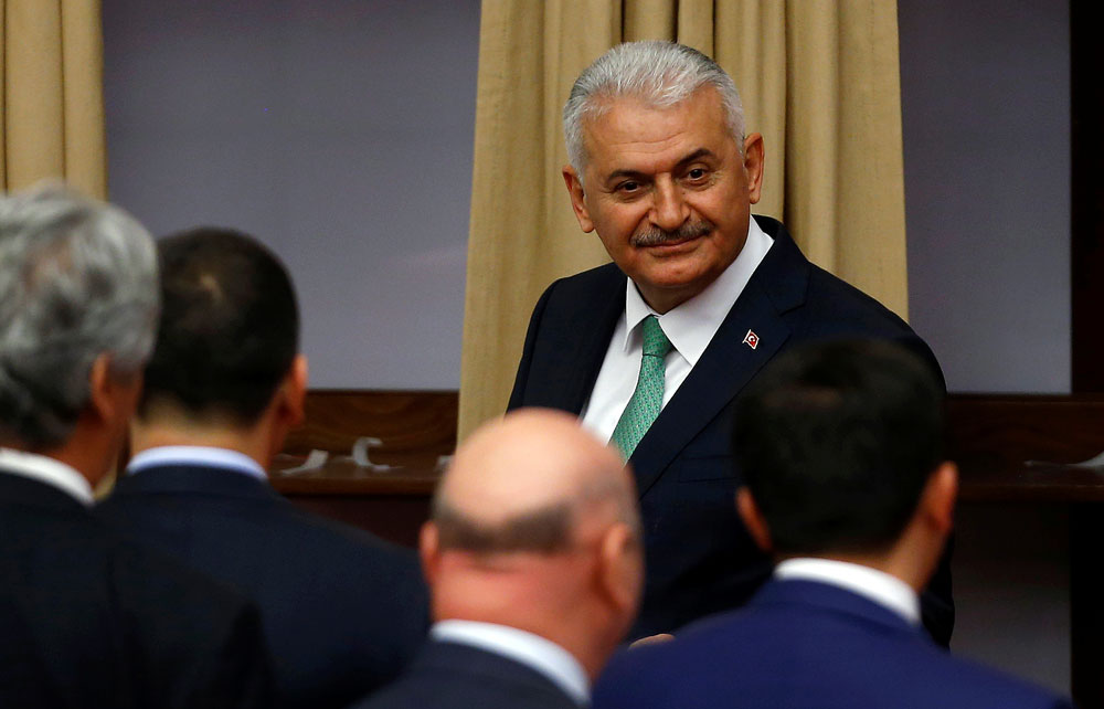 Binali Yildirim attends a debate at the Turkish parliament in Ankara.