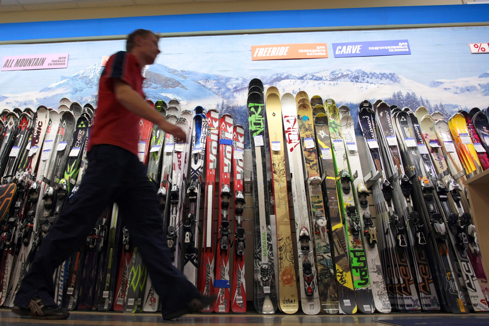 Skis on sale in a SportMaster chain store.