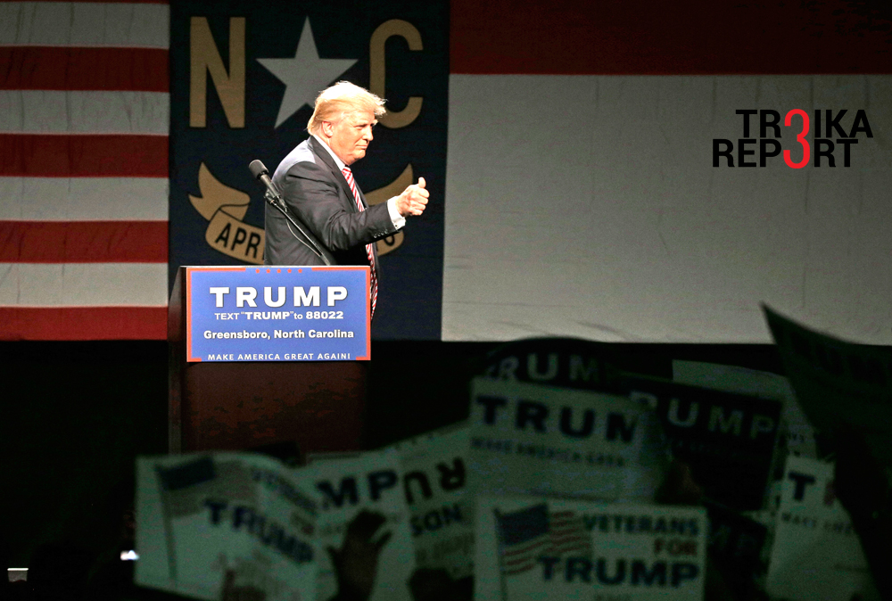 Le candidat républicain Donald Trump félicite ses partisans en quittant la scène après une rencontre dans le cadre de sa campagne électorale à Greensboro, Caroline du Nord, le 14 juin 2016. 
