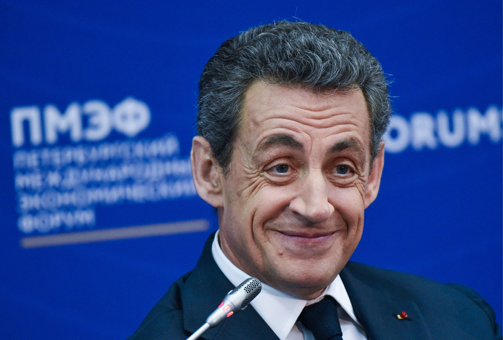 Nicolas Sarkozy, President of France (2007–2012), smiles during a discussion titled "Europe: Quo Vadis?" as part of the 20th St. Petersburg International Economic Forum at the ExpoForum Convention and Exhibition Center in St. Petersburg, Russia, June 16, 2016.