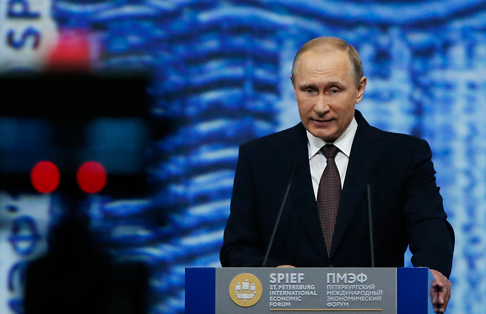 Russian President Vladimir Putin delivers a speech during a session of the St. Petersburg International Economic Forum 2016, June 17, 2016.