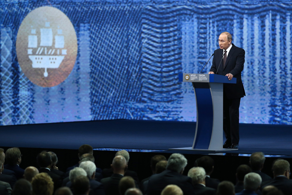 Russian President Vladimir Putin addresses a plenary session titled "Capitalizing on the New Global Economic Reality" as part of the 20th St. Petersburg International Economic Forum, June 17, 2016. 