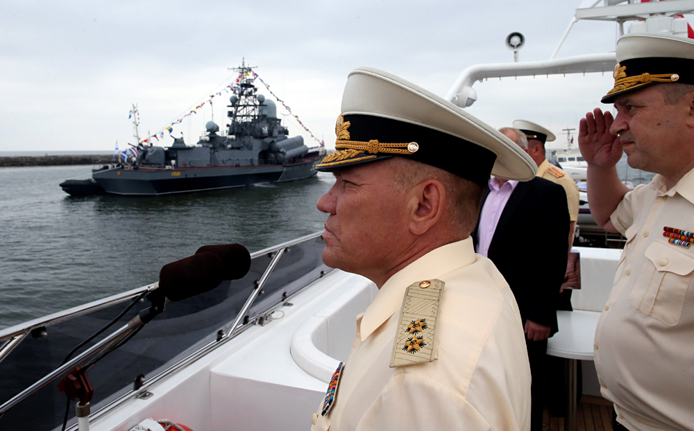 The Commander of the Baltic Fleet, Vice-Admiral Viktor Kravchuk, left, during the general rehearsal for a naval parade on RF Navy Day in Baltiysk.