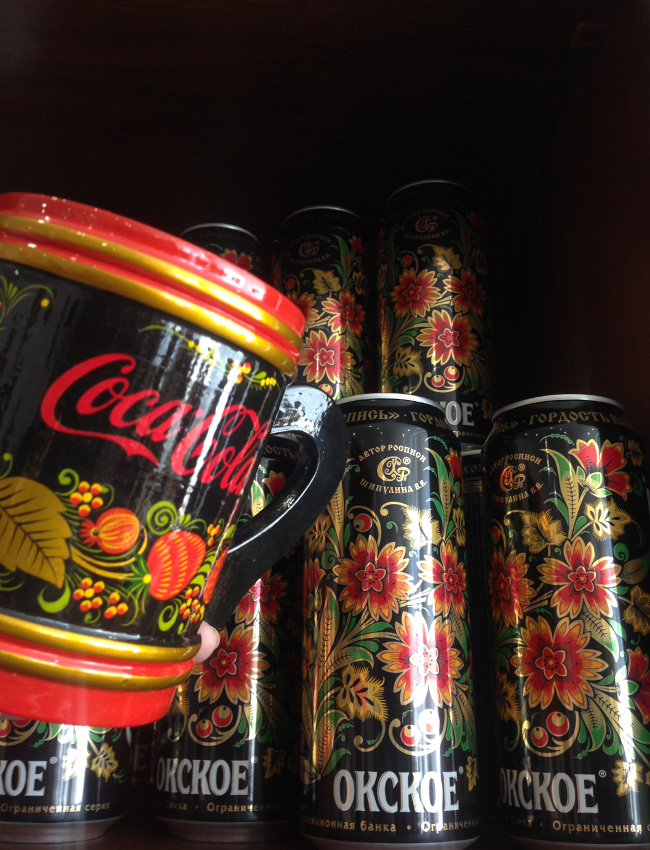 Which do you prefer: a cup with a Coca Cola brand logo or a limited series of beer cans painted with khokhloma?