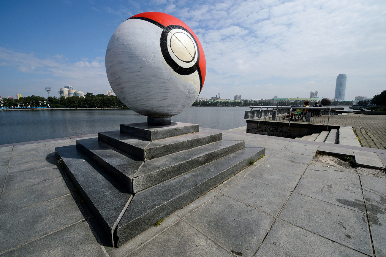 A giant pokeball on an embankment near the Drama Theatre. Unidentified persons painted a stone sphere monument turning it into a giant pokeball from the Pokemon Go mobile game developed by Niantic in the night of July 25-26, 2016