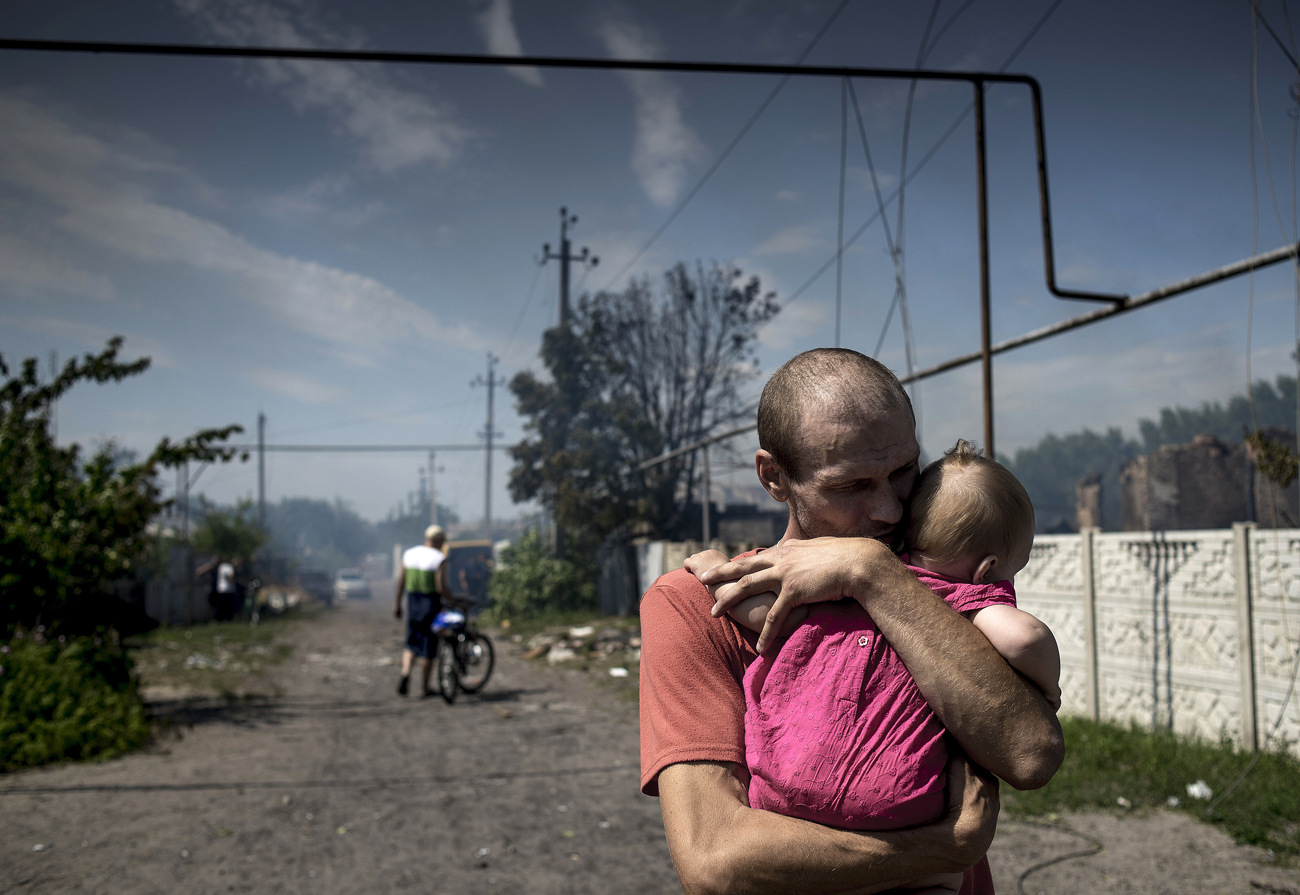 Prebivalci vasi Luganskaja po zračnem napadu ukrajinske vojske.