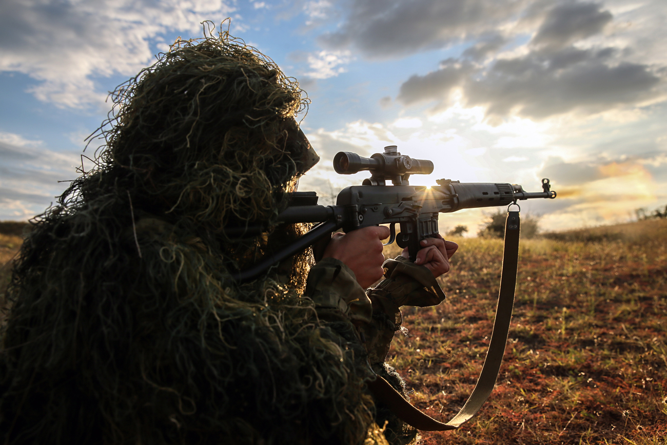 STAVROPOL TERRITORY, RUSSIA - SEPTEMBER 7, 2016: A sniper seen during tactical exercises held by motorized infantry units of Russia's Southern Military District as part of the Caucasus 2016 strategic drills, at Sernovodsky range. 