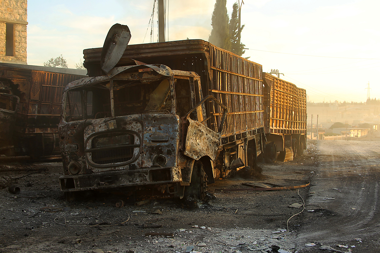 Damaged aid trucks are pictured after an airstrike on the rebel held Urm al-Kubra town, western Aleppo city, Syria, on Sept. 20, 2016. 