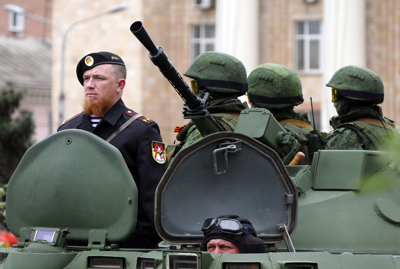 Arseny Pavlov (left), also known as 'Motorola', during the rehearsal of the military parade in Donetsk.