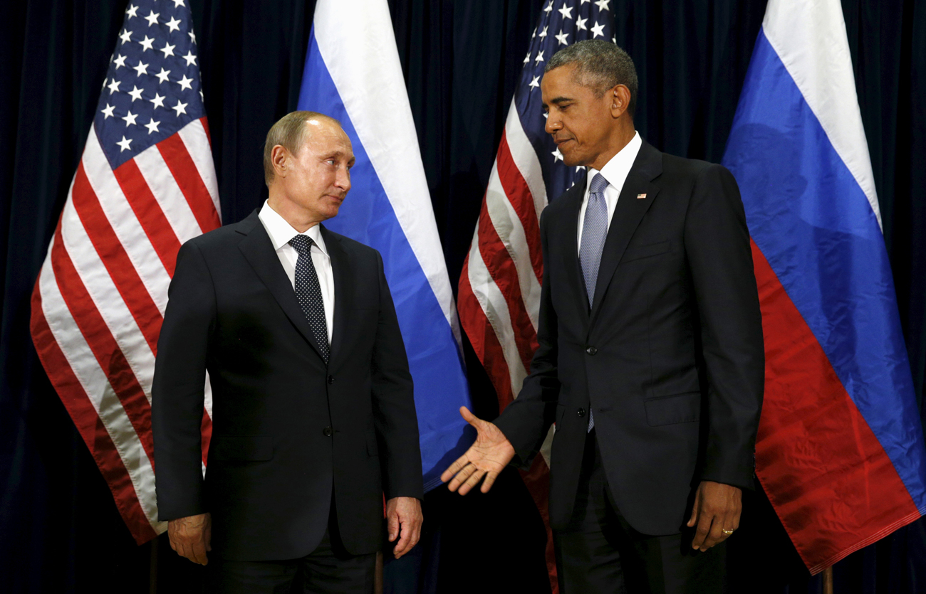 U.S. President Barack Obama extends his hand to Russian President Vladimir Putin during their meeting at the United Nations General Assembly in New York on Sept. 28, 2015.