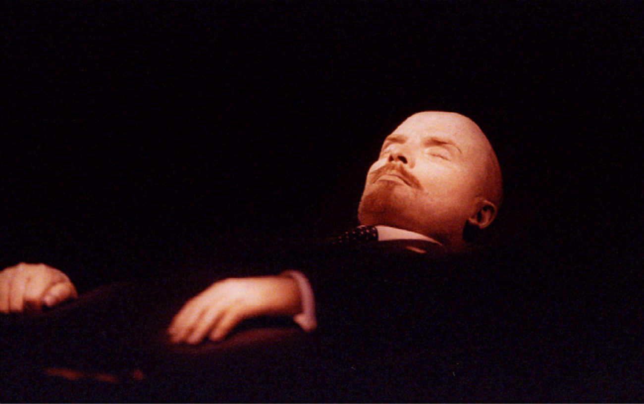 The body of Vladimir Lenin , the Soviet state founder lies in the Mausoleum of Lenin on Red Square.
