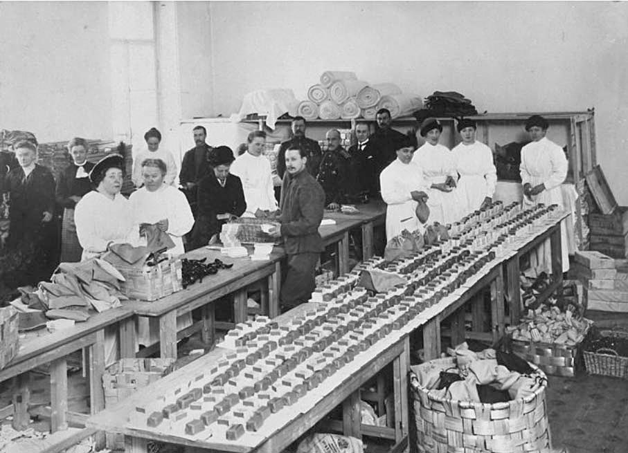 She made sure that some public taxes went to the Red Cross society. During the First World War, 10 cents from the price of every telegram were sent to the Red Cross. / Red Cross workers packing soap.
