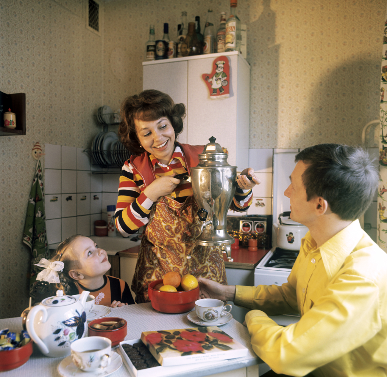 Soviet kitchen gadgets. (Vladimir Drozdov, service engineer at the 1st Moscow cotton-printing mill, at home with his wife Marina and daughter Anya.) 