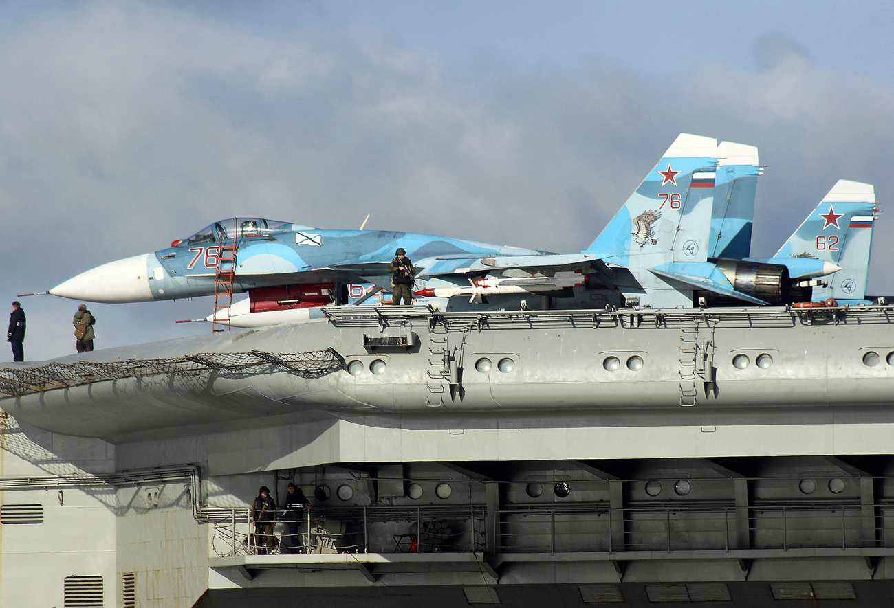 Sukhoi Su-33 Flanker-D fighters aboard the aircraft carrier Admiral Kuznetsov sails together with the Russian Northern Fleet's carrier battle group.