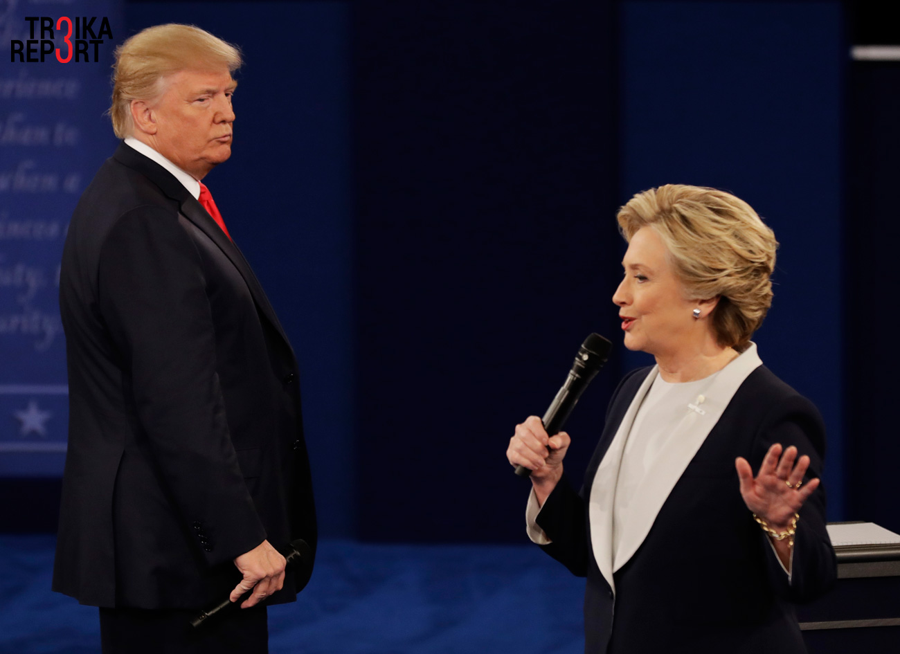 Republican presidential nominee Donald Trump listens to Democratic presidential nominee Hillary Clinton during the second presidential debate at Washington University in St. Louis.