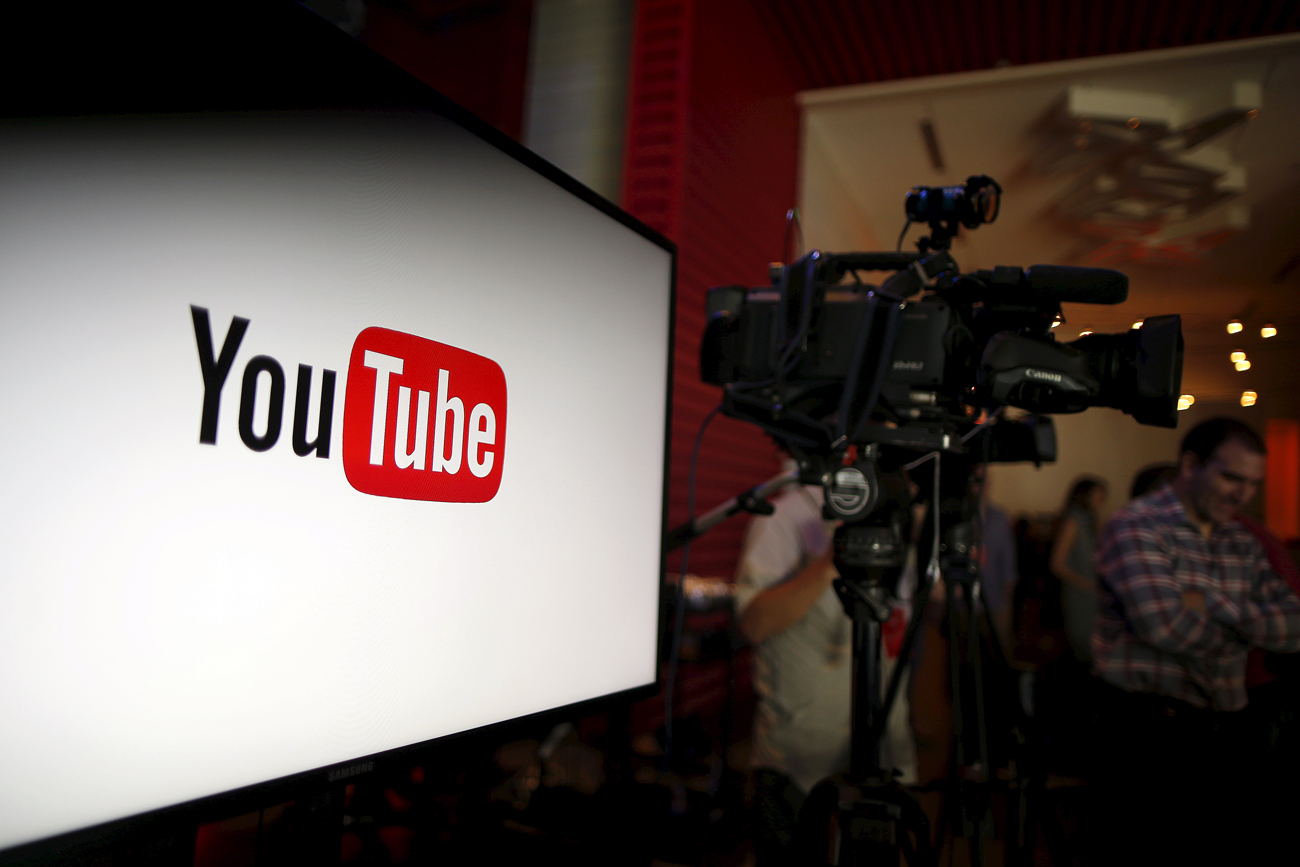 Alphabet Inc's YouTube will launch a $10-a-month subscription option in the United States on October 28 that will allow viewers to watch videos from across the site without interruption from advertisements, the company said