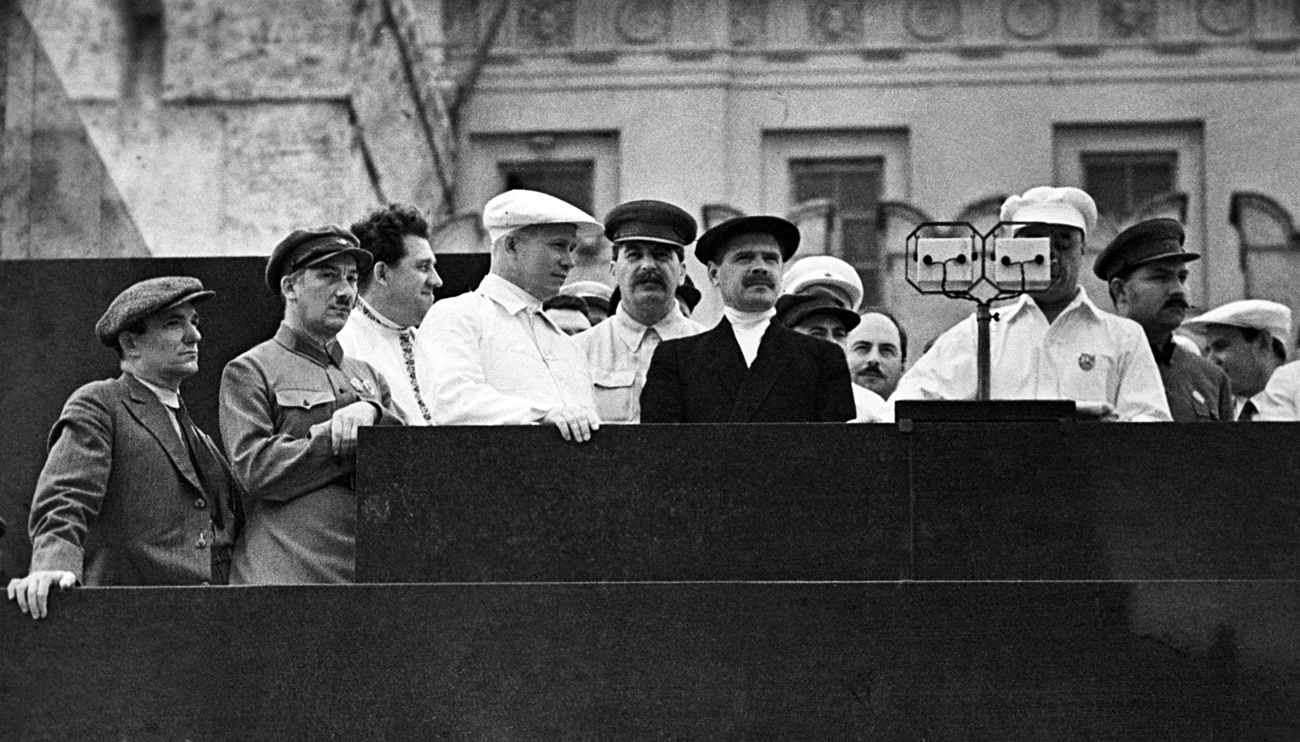 Joseph Stalin and his People's Commissars standing on the tribune of Lenin's Mausoleum during a Parade of Athletes.