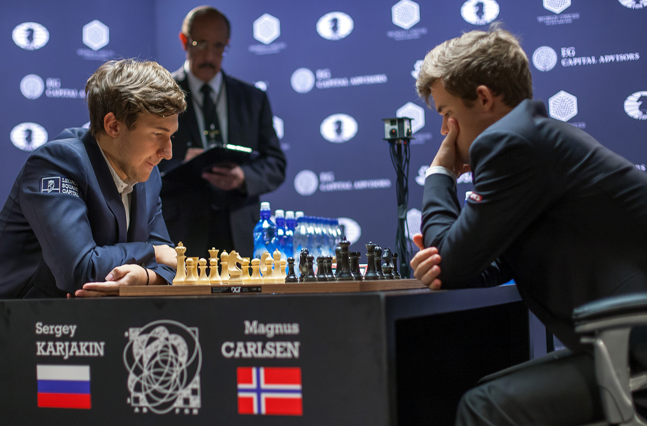 Norway's Magnus Carlsen retains World Chess Championship after tie-breaker