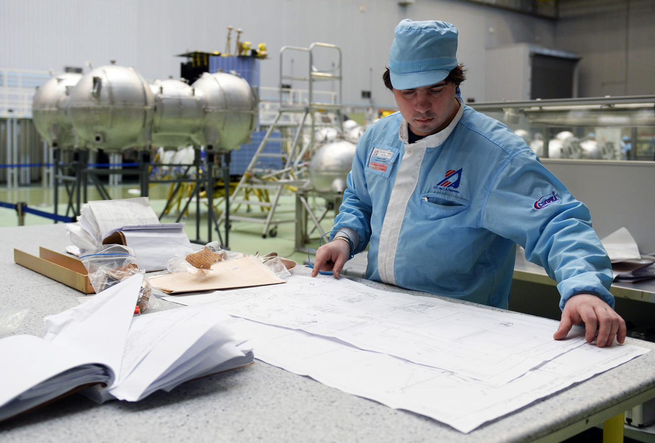 A staff member in the department of spacecraft assembly at the Lavochkin Research and Production Association, in the Moscow region.