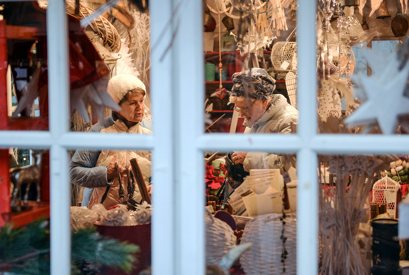 Shoppers in a souvenir stall at a Christmas fair in Moscow.