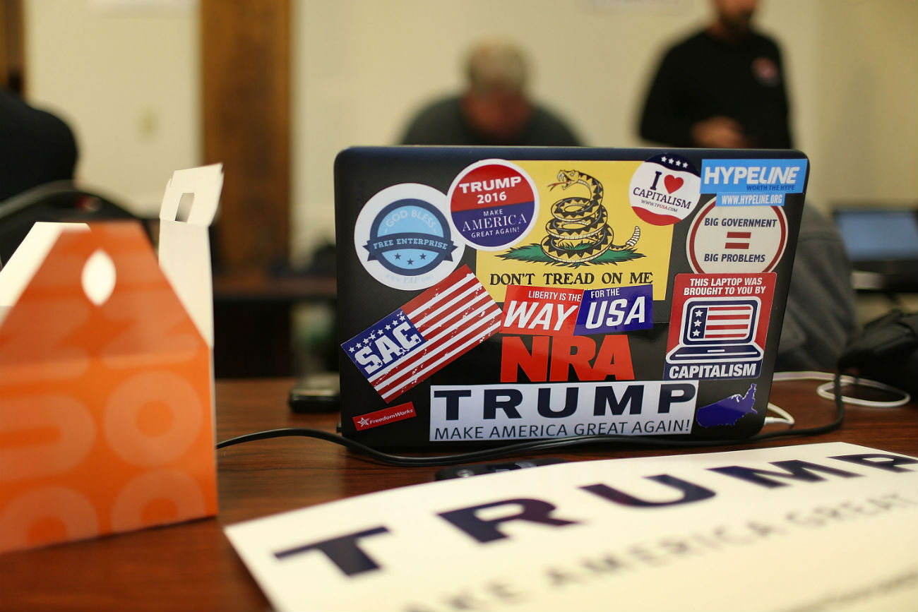 A computer is covered with stickers as volunteers call people asking them to vote for Republican presidential canddiate Donald Trump.