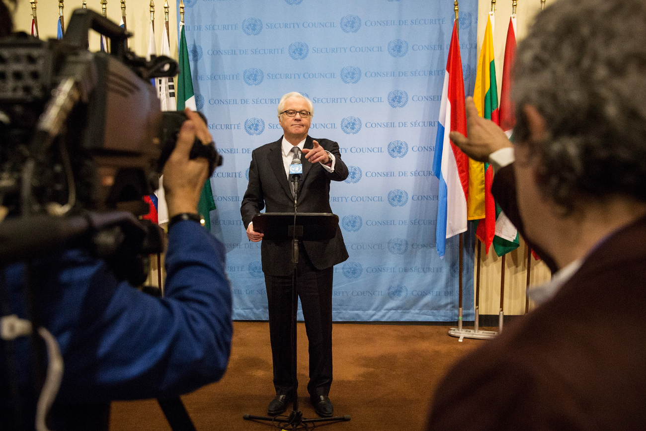 Russian Permanent Representative to the United Nations (UN) Vitaly Churkin speaks to members of the media after a UN Security Council meeting
