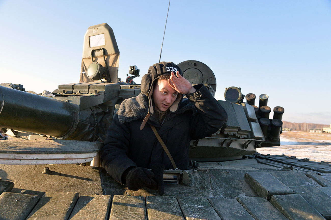 A tank driver in the T-80 tank 