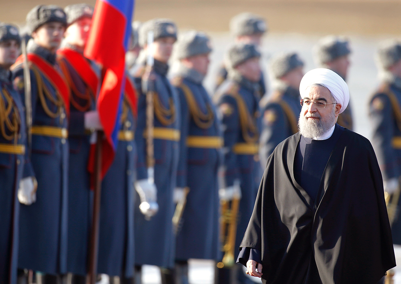 Si la Russie et l’Iran ont des vues proches, les divergences perdurent. Sur la photo : Hassan Rohani à Moscou. 
