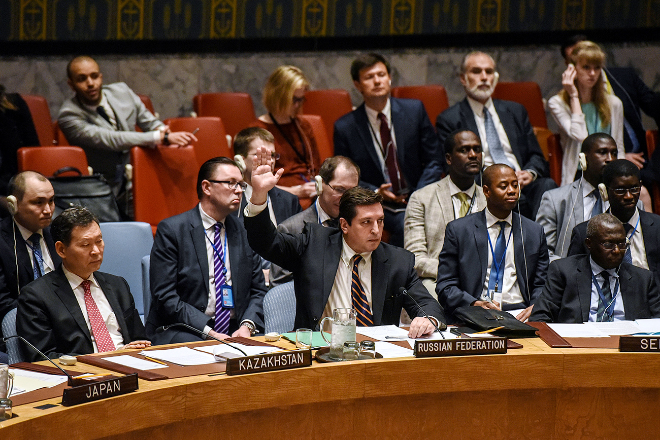 Russian Deputy Ambassador to the United Nations Vladimir Safronkov votes against a draft resolution condemning the reported use of chemical weapons in Syria at the Security Council meeting on the situation in Syria at the United Nations Headquarters in New York, U.S., April 12, 2017