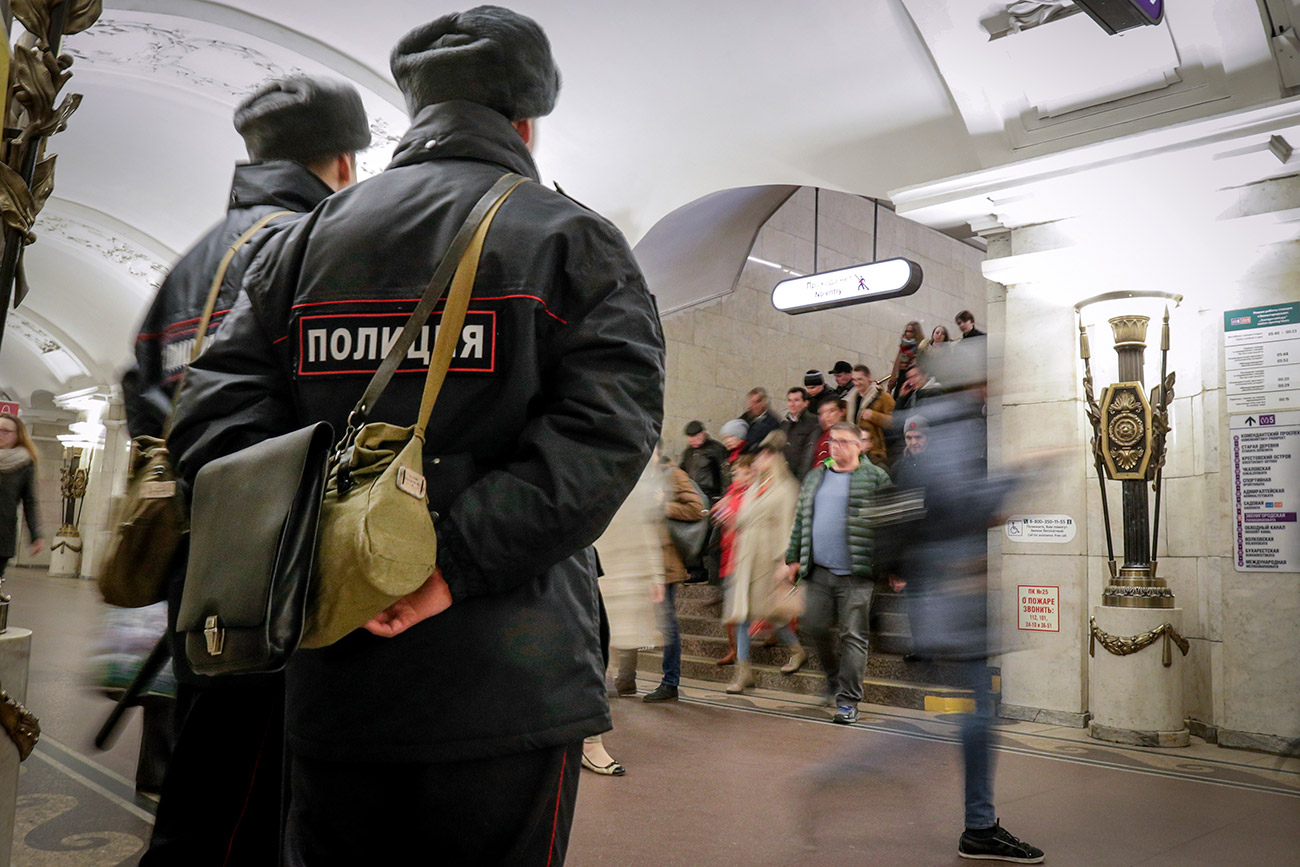 Policemen patrol at Pushkinskaya subway station in St.Petersburg, Russia, Friday, April 7, 2017. A bomb blast tore through a subway train under Russia's second-largest city on Monday, killing many people and wounding many others.
