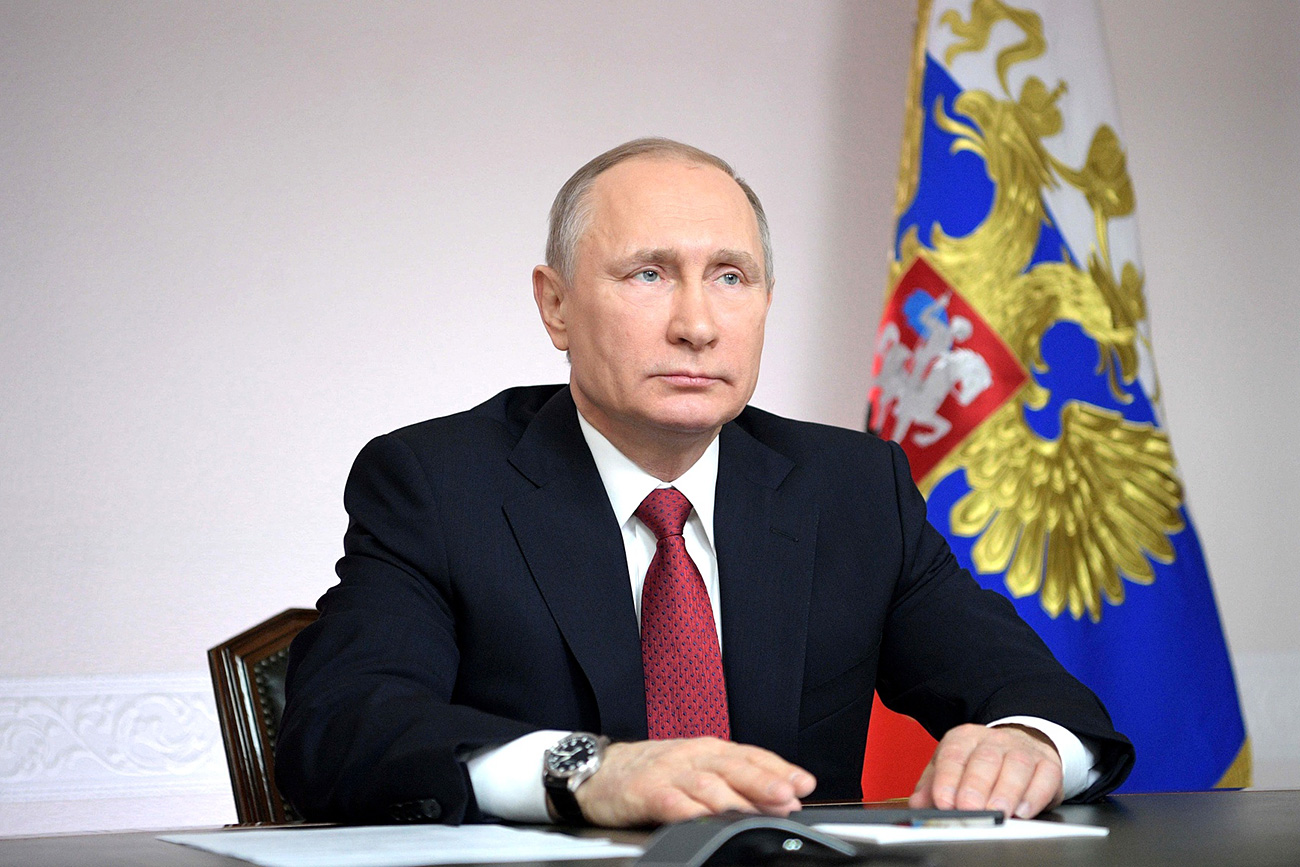 Russian President Vladimir Putin holds a video conference on the first voyage of an Arctic gas tanker to the Sabetta port.