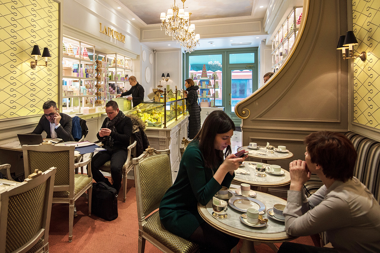 Customers in a bakery of the French chain Laduree in Moscow.