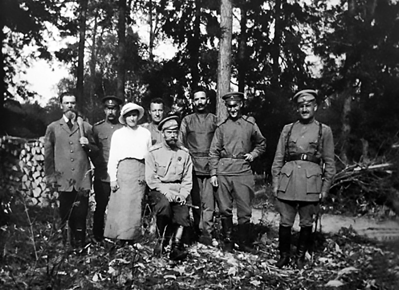 “During the day we chopped down some big fir trees at the crossing of the three roads along the Arsenal. There was a colossal fire, the sun was reddish, and in the air was the smell of burning, probably from peat burning somewhere. We went sailing for a little while. During the evening we walked until eight o'clock. I started the volume of Le Comte de Monte Christo,” Nicolas II wrote in his diary on June 5, 1917. // Pictured: Nicolas II with his daughter Anastasia and their servants in Alexander Palace Park, Tsarskoye Selo.