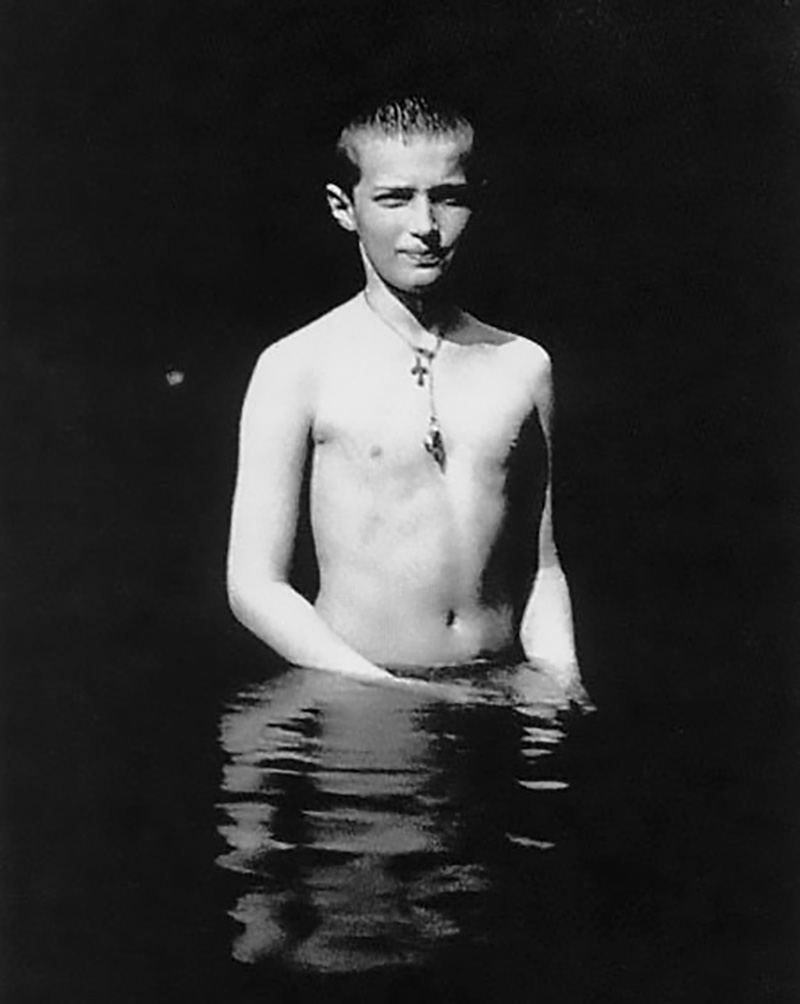  Alexei was the last child in the Romanov family. That summer he turned 13. He was seriously ill and suffered from hemophilia, a common illness other descendants of British Queen Victoria suffered. // Prince Alexei taking a bath in the lake of Alexander Palace garden.