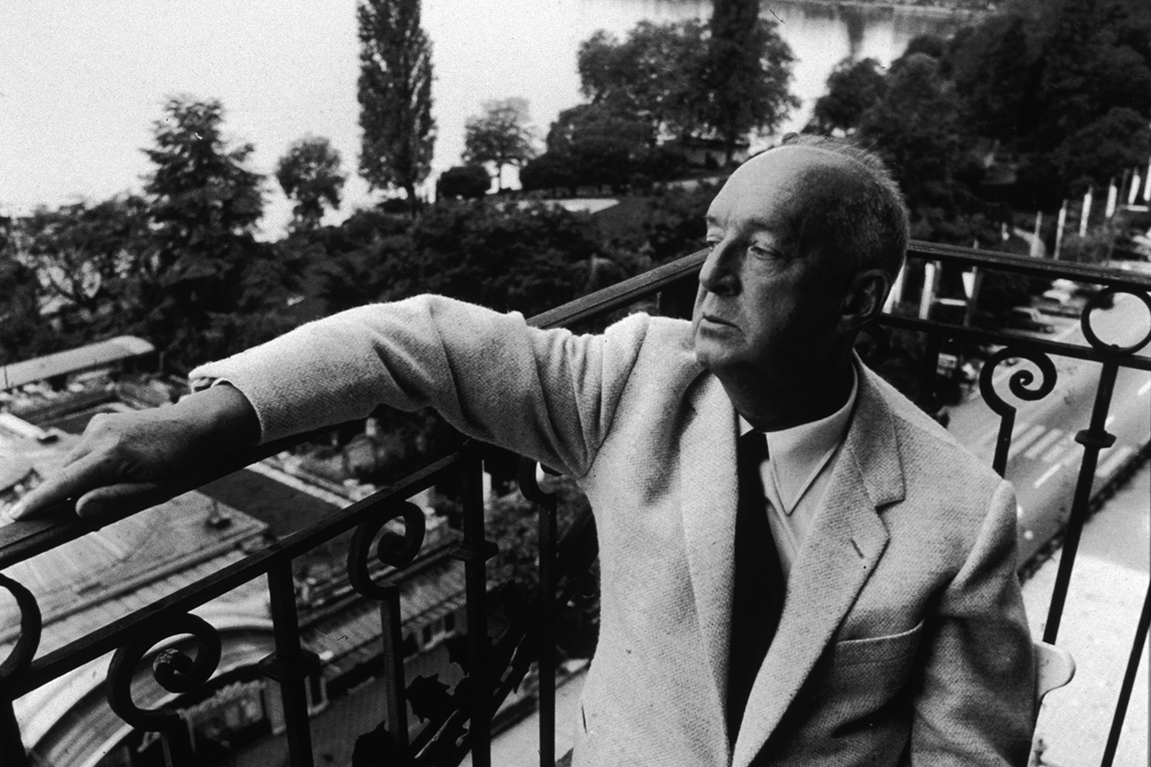 Russian-born novelist Vladimir Nabokov sits on a verandah overlooking Lake Geneva in his suite at the Montreux Palace Hotel, Switzerland (1965).