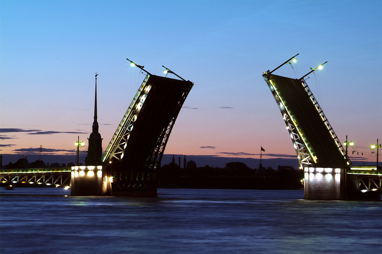 Palace drawbridge risen. The Neva River, night time. St. Petersburg, Russia.