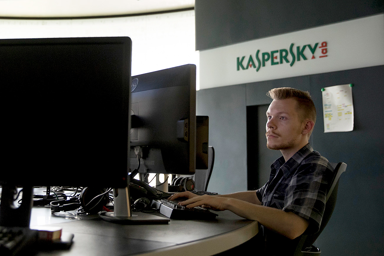 An employee of Kaspersky Lab works on computers at the company's headquarters in Moscow, Russia