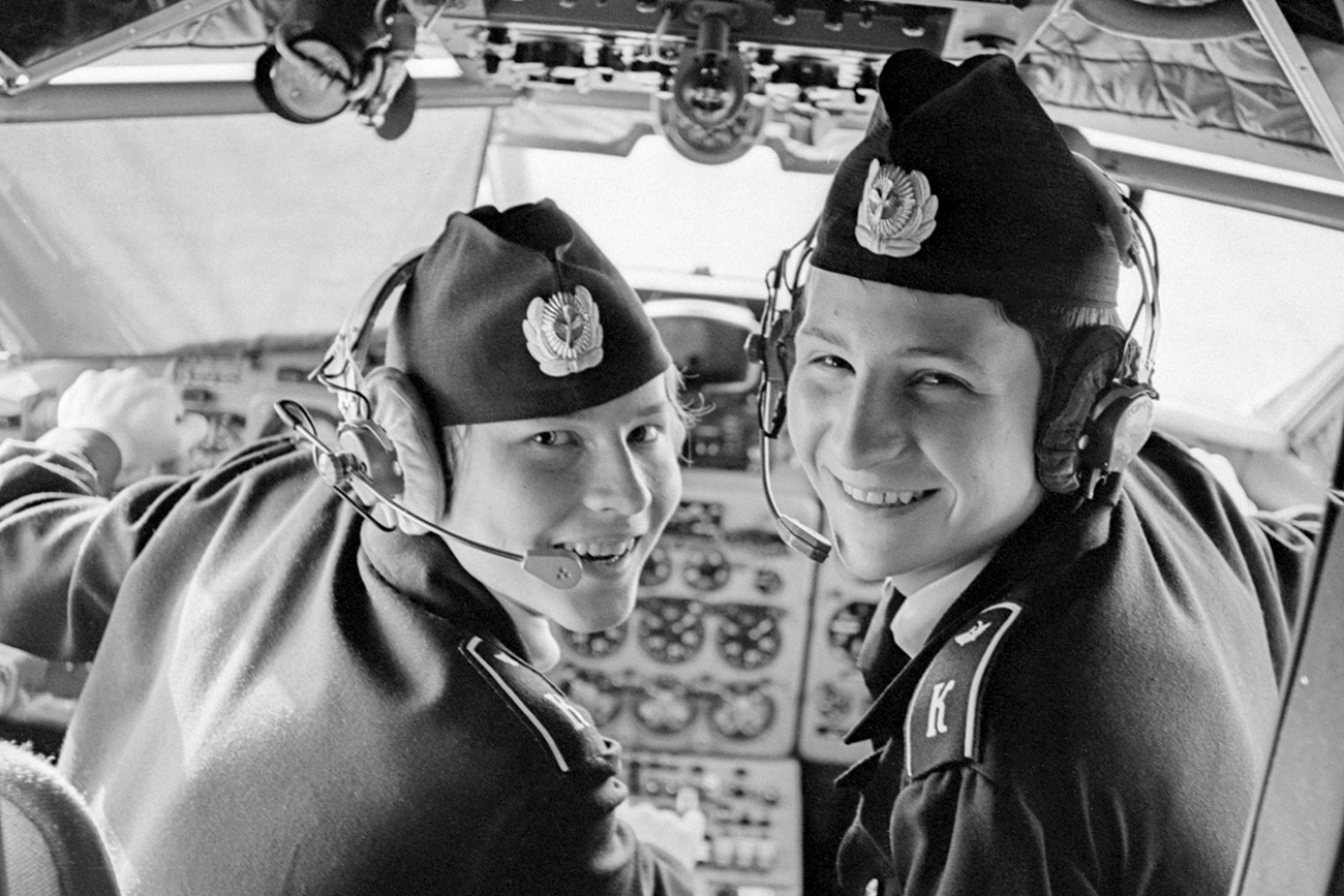 USSR. April 8, 1977. Young pilot school students Valery Terpugov and Sergey Suchkov (L-R) pictured in the YAK-40 aircraft cabin.