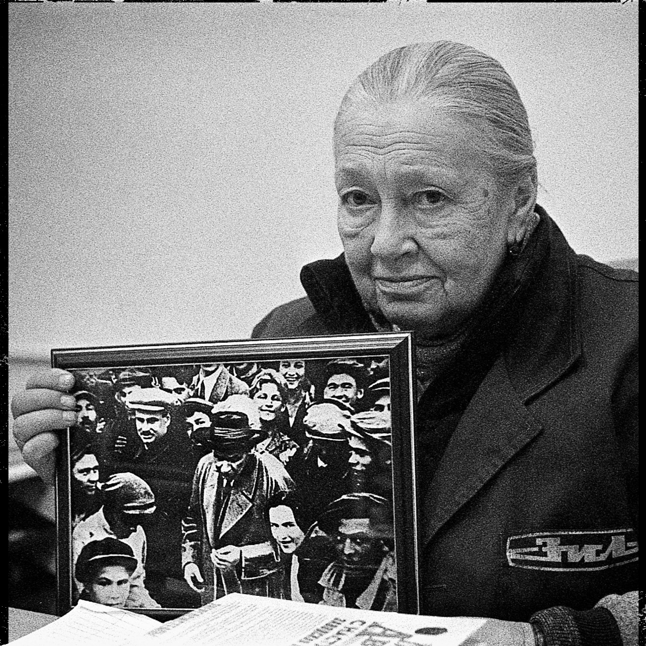 Inessa Storozhenko joined the plant in 1962. The photo she is holding depicts writer Maxim Gorky, her father Miron Klitskin and plant director Ivan Likhachev. “Likhachev was the deputy head of the party district committee. Later he became Stalin’s pet,” she recalls. “He was very foulmouthed at times.”