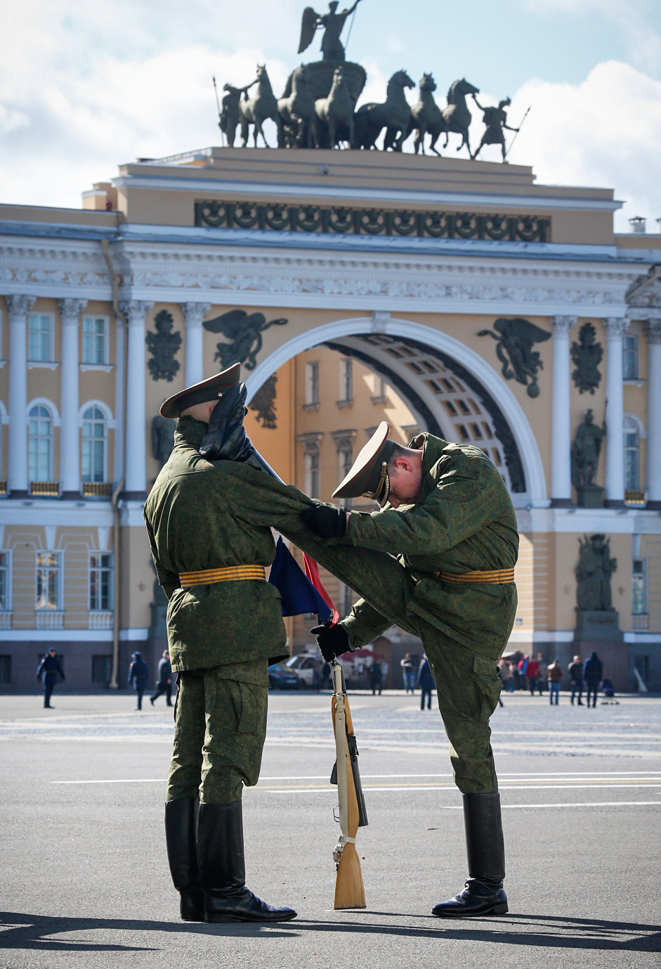 Soldiers warm up prior to a rehearsal for the Victory Day military parade