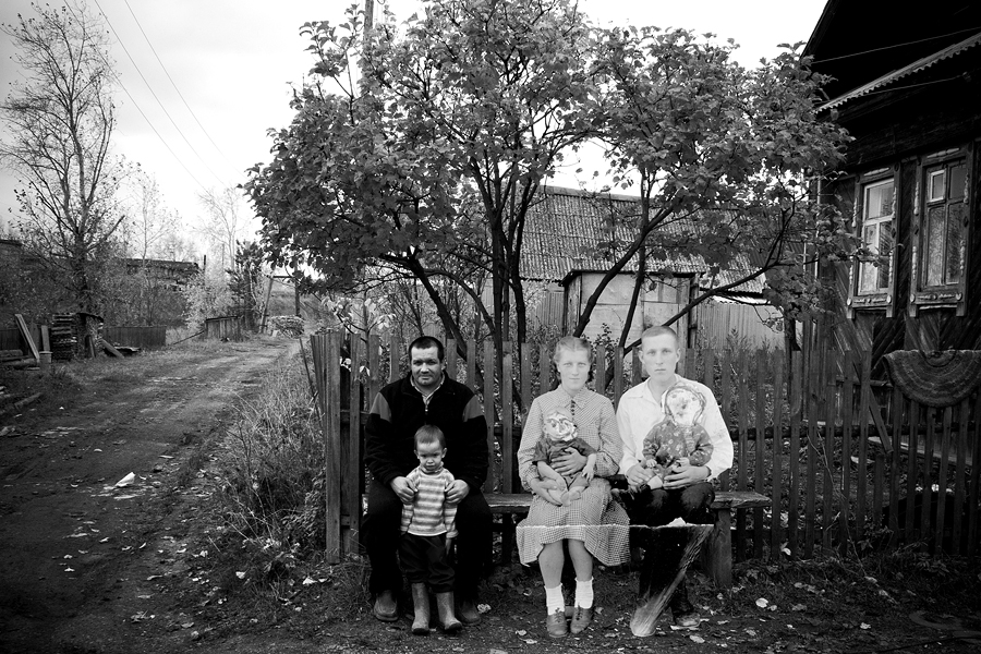 For this project, photographer Sergei Poteryaev used his own photographs and found archive footage of residents. "I was using montage to understand whether there are any parallels between the life of the people of Staraya Utka then and now," he says.