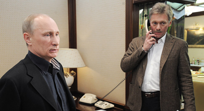Dmitry Peskov (R) was appointed as Vladimir Putin's press secretary in 2000. Source: RIA Novosti
