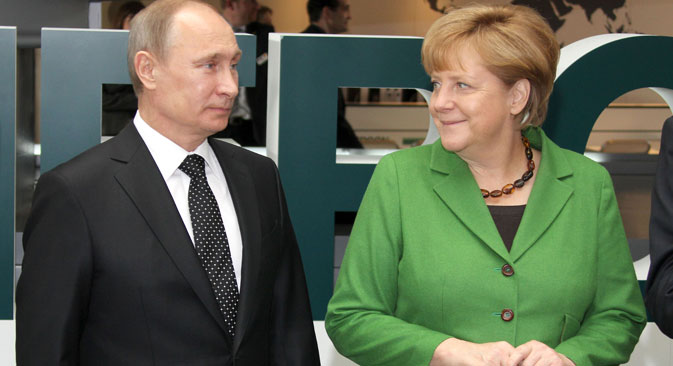 Der russische Präsident Wladimir Putin und die Bundeskanzlerin Angela Merkel während der Hannover Messe im April 2013. Foto: DPA