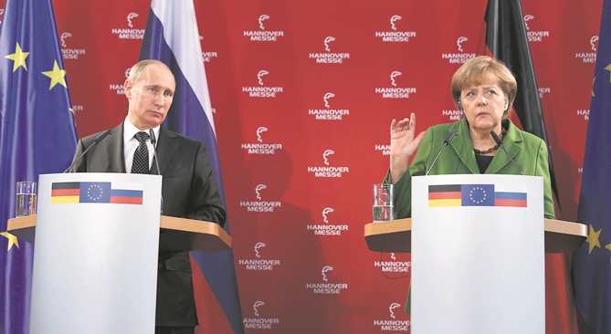 Der Dialog soll wieder besser werden. Wladimir Putin und Angela Merkel auf der Hannover Messe 2013. Foto: Reuters