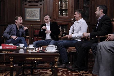 President of Russia Dmitry Medvedev shares a laugh with actors of Comedy Club TV show Igor Kharlamov, Timur Batrutdinov and Garik Martirosyan (L-R) at Gorki residence. Source: ITAR-TASS