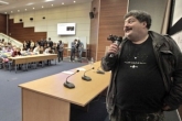 Writer Dmitry Bykov reads a dication text to Moscow residents taking part in the nationwide campaign and literacy test "Total Dictation" at the Moscow School of Social and Economic Sciences. Source: RIA Novosti