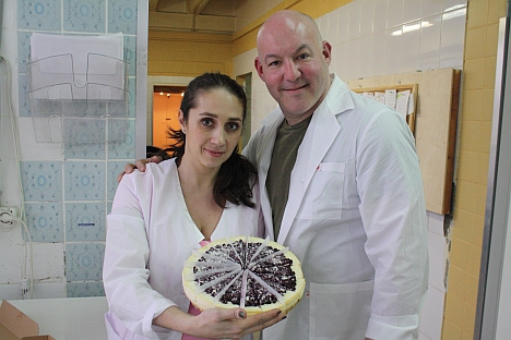 Yulia and Brad Garine show off one of their popular cheesecakes. Source: Press Photo