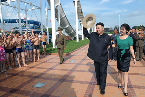 Tha fact that North Korean leader Kim Jong-un has been accompanied by his wife, Ri Sol-ju, indicates that young North Korean leader Kim Jong-un has opted for a new leadership style. Source: AP