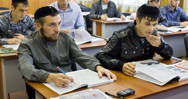 As an attempt to resolve problems in North Caucasus and improve its image, Russia's authorities promote education in the region on federal level. Pictured: Students during their classes in the Russian Islamic University in Grozny, the Chechen capital