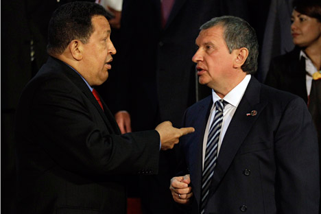 Despite Hugo Chavez's presidential victory the risks for Russia's private oil companies are too high. Pictured (L-R): Venezuelan President Hugo Chavez and Rosneft's Head Igor Sechin. Source: AP